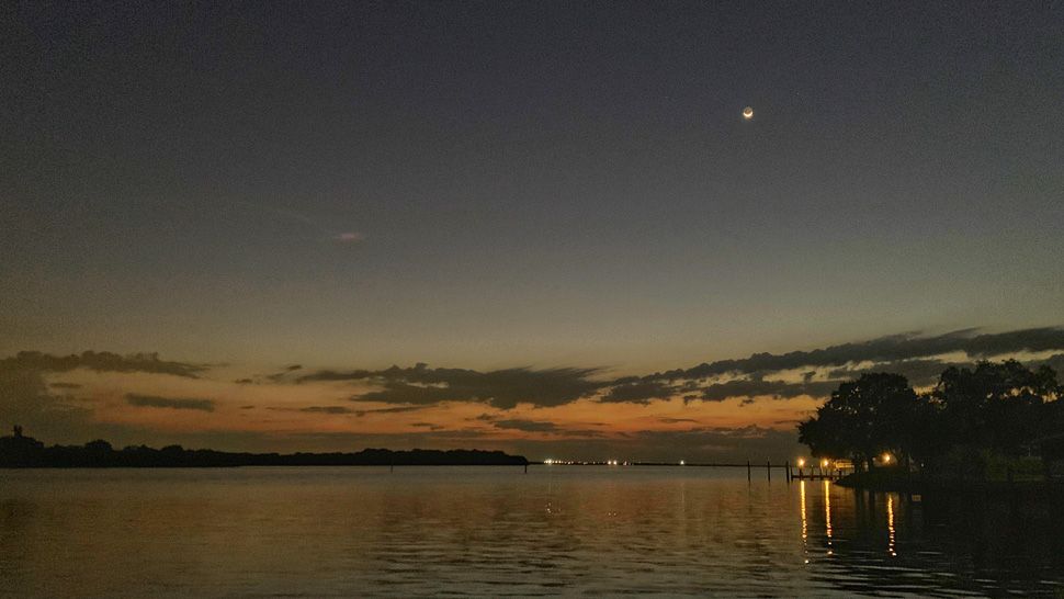  Sent to us with the Spectrum News 13 app: The crescent moon was seen over the Florida waters on Thursday, September 26, 2019. (Photo courtesy of Tanji Shelton, viewer)