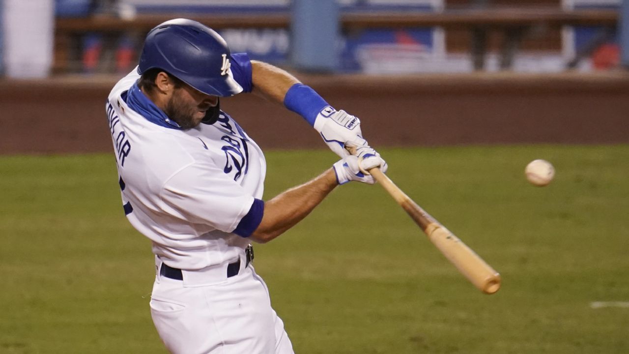 Dodgers set NL homer mark for month at 57, beat Rangers 7-2