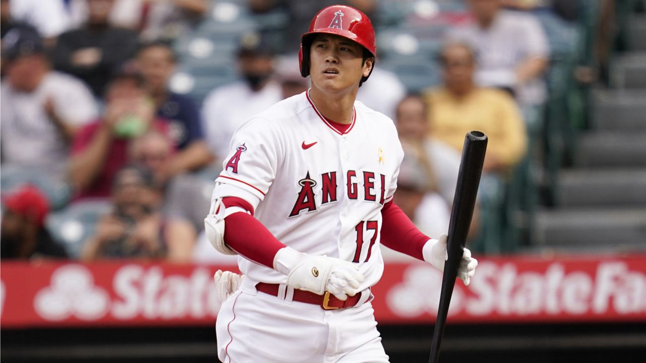 Los Angeles Angels designated hitter Shohei Ohtani reacts after striking out during the first inning of a baseball game against the New York Yankees Wednesday, Sep. 1, 2021, in Anaheim, Calif. (AP Photo/Ashley Landis)