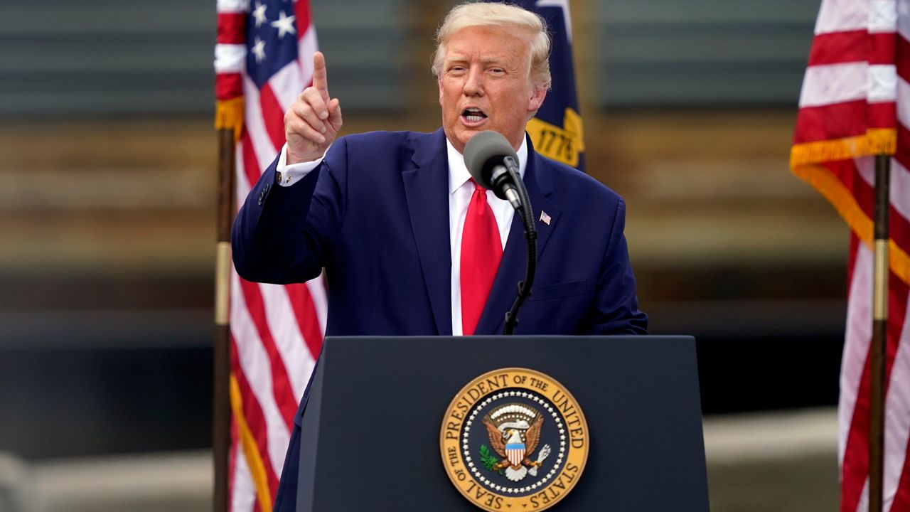 Pres. Donald Trump says polls showing Democratic challenger Joe Biden ahead are "fake" and don't include what he calls his "silent majority," who are voters will will come on on Nov. 3 to vote for his reelection. (Photo AP)