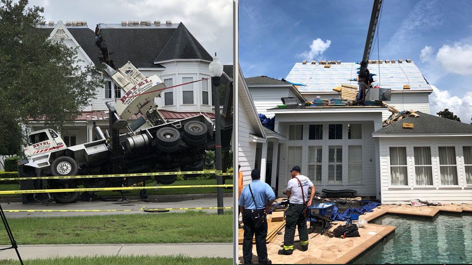 Lower Park Road is closed until cranes can be brought in to remove this crane from the house. (Paula Machado, Staff; Orlando Fire Dept.)