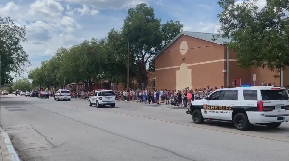 Boerne community members line the streets to welcome back injured Officer Michele Van Stavern during a procession of police vehicles September 3, 2019 (Courtesy: Boerne Police Department)