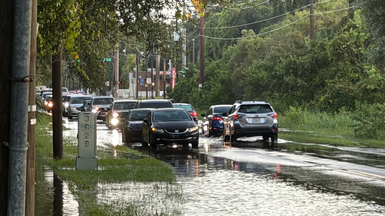 A late afternoon storm sends water into a Tampa roadway. (Bay News 9) 