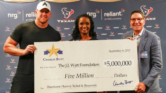 J.J. Watt, left, received a $5 million donation from HEB's CEO Charles Butt for his Hurricane Harvey recovery fundraiser in September. (Handout photo) 