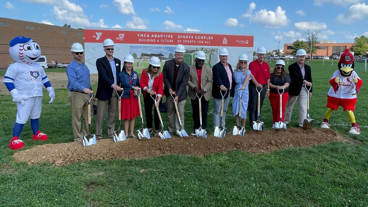 Representatives for the St. Louis Cardinals, the Gateway Region YMCA, Boniface Foundation and Miracle League broke ground Wednesday on what will become a $5.2 million Adaptive Sports Complex at the South County YMCA. (Spectrum News/Gregg Palermo)