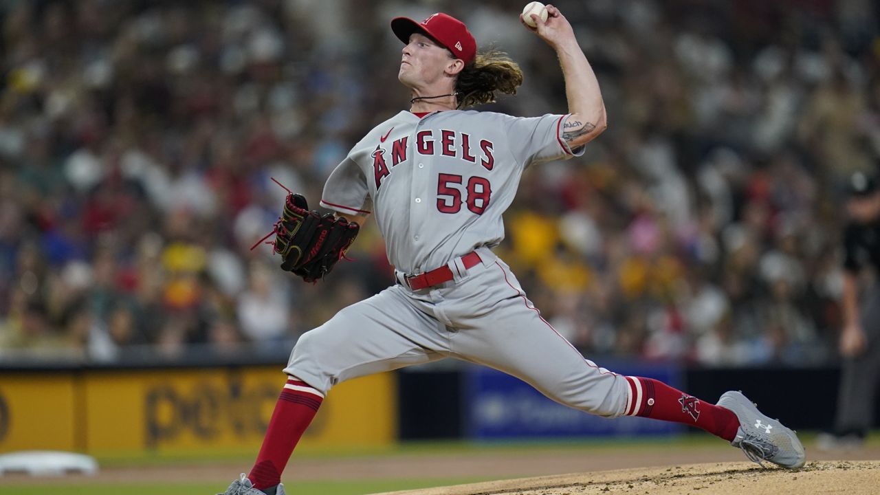 Los Angeles Angels starting pitcher Packy Naughton works against a San Diego Padres batter during the first inning of a baseball game Tuesday, Sept. 7, 2021, in San Diego. (AP Photo/Gregory Bull)