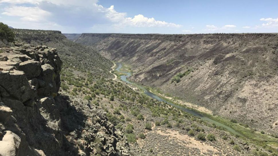This August 2018 photo shows the Taos Gorge in New Mexico. Hikers have embarked on a 500-mile (805-kilometer) expedition that will traverse New Mexico. The mission: Chart out the best route and identify what challenges might lay ahead as the state moves closer to establishing the Rio Grande Trail. Following in the footsteps of other states, New Mexico is looking to capitalize on its vistas, mild weather and culture with the creation of a long-distance trail along one of North America’s longest rivers. (AP Photo/Susan Montoya Bryan)