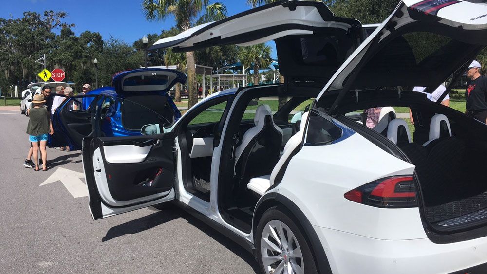 New Port Richey residents got a chance to check out electric vehicles at the first ever Electric Vehicle Tailgate. (Tim Wronka, Staff)
