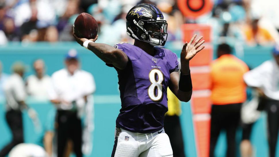 Lamar Jackson has 4 TDs as Ravens roll past Browns