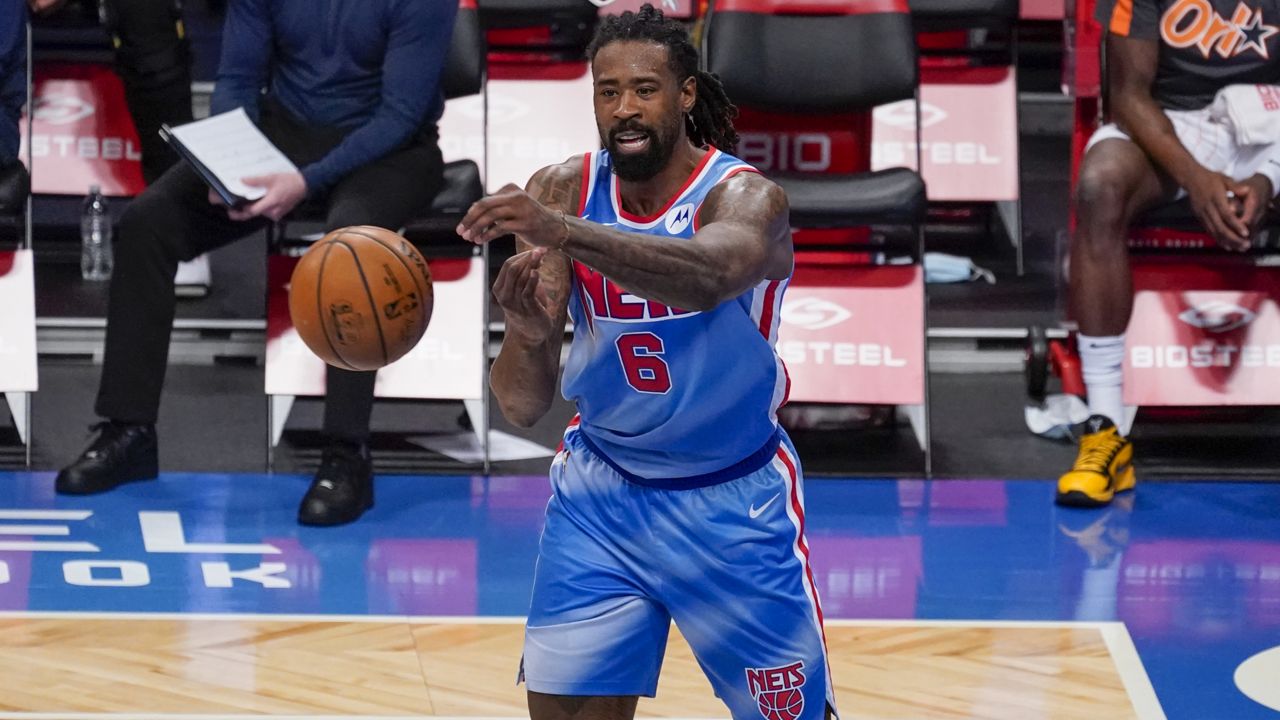 Brooklyn Nets center DeAndre Jordan handles the ball during the second half of an NBA basketball game against the Orlando Magic, Saturday, Jan. 16, 2021, in New York. (AP Photo/Mary Altaffer)