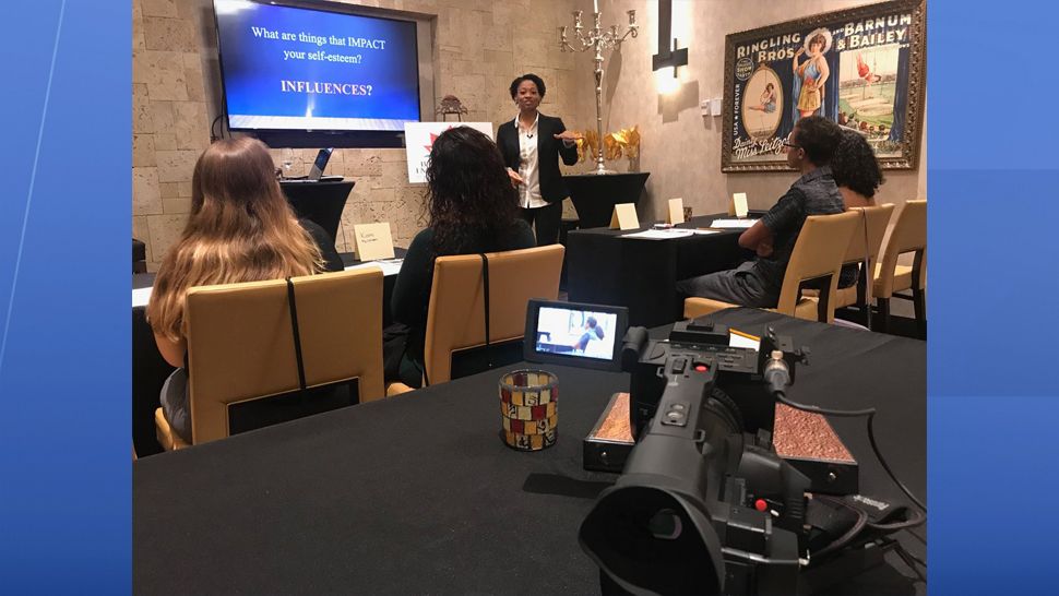 The Kappa Alpha Psi fraternity sponsored a group of ten minority teenagers for the Blooming Impressions program that focuses on personal development and life skills. (Angie Angers, staff)