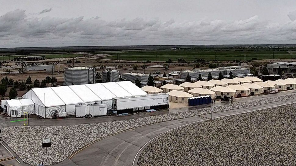 FILE - This undated file photo provided by HHS' Administration for Children and Families shows the shelter used to house unaccompanied foreign children in Tornillo, Texas. The U.S. government says the West Texas tent shelter will remain open through the end of the year. A spokesman for the U.S. Department of Health and Human Services said Tuesday, Sept. 11, 2018, that the facility will be expanded to 3,800 beds from its initial capacity of 360 beds. (HHS' Administration for Children and Families via AP, File)