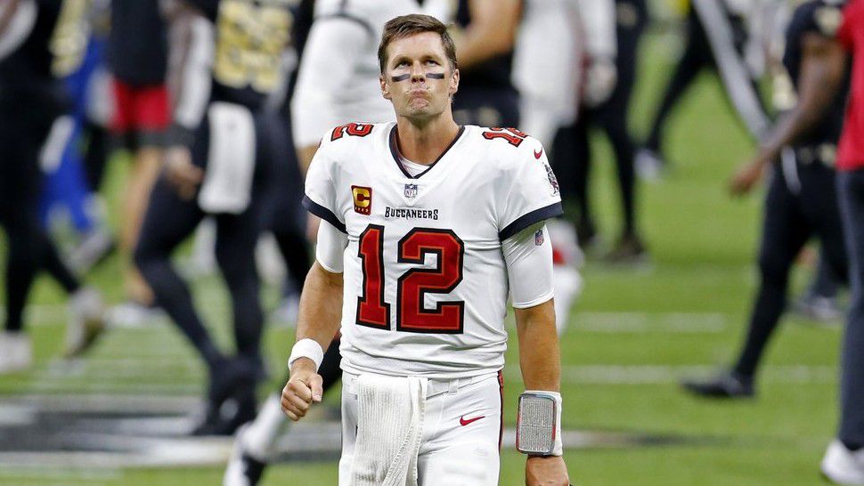 Tampa Bay Buccaneers quarterback Tom Brady (12) reacts after an NFL football game against the New Orleans Saints in New Orleans, Sunday, Sept. 13, 2020. The Saints won 34-23. (AP Photo/Brett Duke)