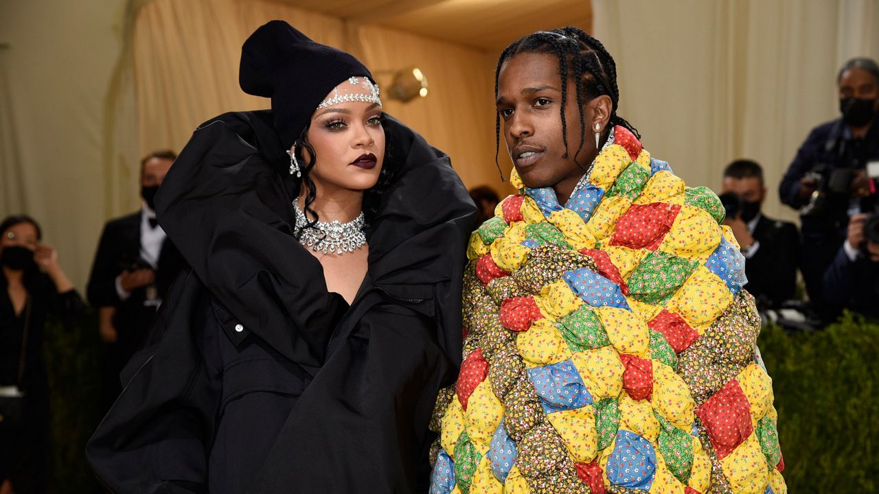 Rihanna, left, and A$AP Rocky attend the Met Gala.