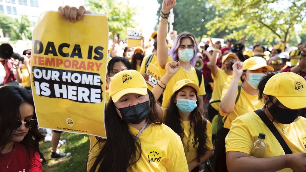 Susana Lujano, left, a dreamer from Mexico who lives in Houston, joins other activists to rally in support of the Deferred Action for Childhood Arrivals program, also known as DACA, at the Capitol in Washington, Wednesday, June 15, 2022. A federal judge on Wednesday, Sept. 13, 2023, declared illegal a revised version of a federal policy that prevents the deportation of hundreds of thousands of immigrants brought to the U.S. as children. (AP Photo/J. Scott Applewhite, File)