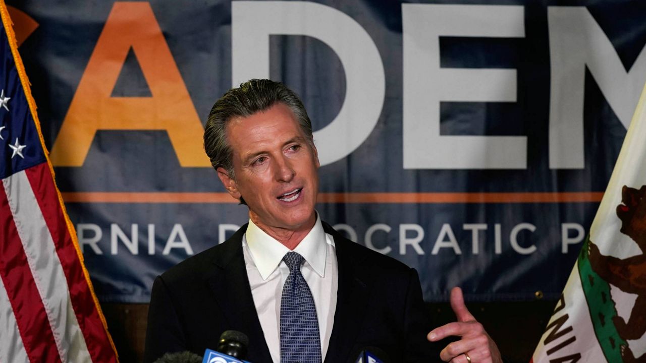 California Gov. Gavin Newsom addresses reporters after beating back the recall that aimed to remove him from office, at the John L. Burton California Democratic Party headquarters in Sacramento, Calif., Sept. 14, 2021. (AP Photo/Rich Pedroncelli, File)