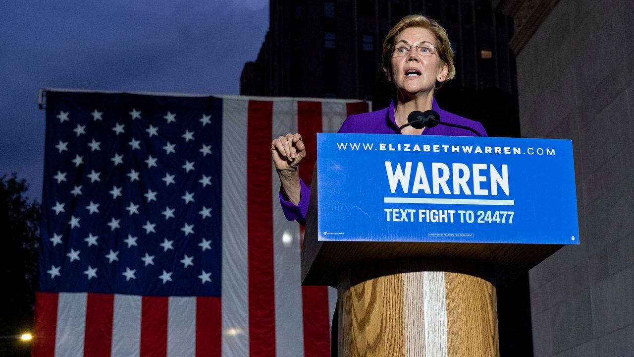 Warren Comes to Town & The Great License Plate Debate