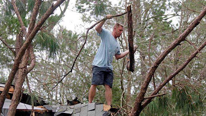 Man cleans up around home in North Carolina