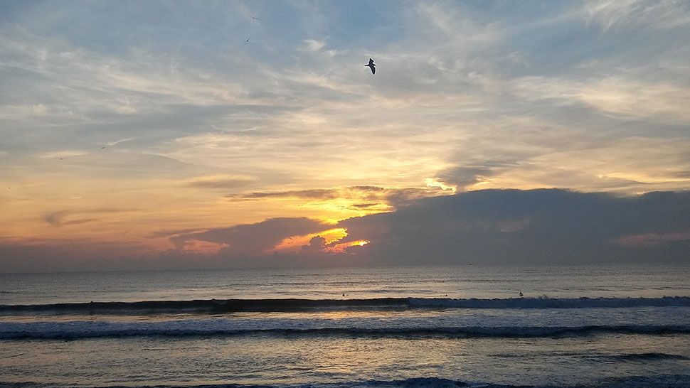 Submitted via the Spectrum News 13 app: Sunrise in Satellite Beach, Sunday, Sept. 16, 2018. (Mark Smith, viewer)