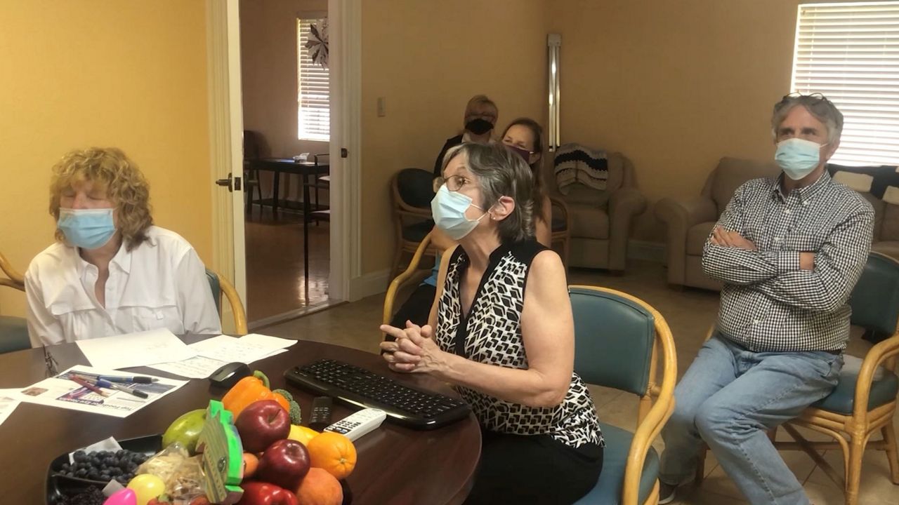 Every week, organizers at the center schedule a Zoom call, where dozens of members can socialize and play virtual games together. (Gabrielle Arzola/Spectrum Bay News 9)