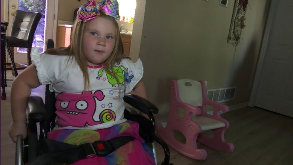 Girl with paralyzing illness