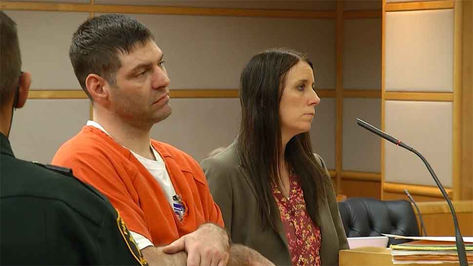 Michael Harbaugh (left) stands alongside a public defender in a Pinellas County courtroom on Wednesday, Sept. 18, 2019. (Spectrum Bay News 9)