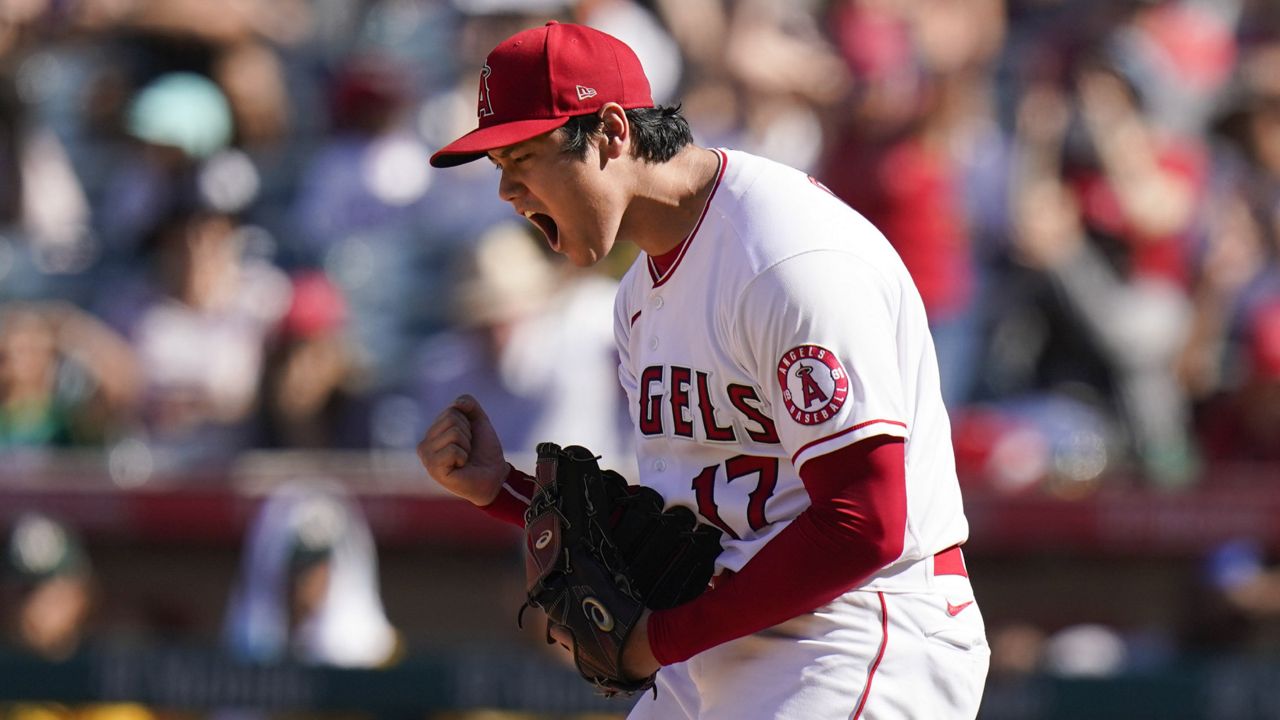 Los Angeles Angels starting pitcher Shohei Ohtani, of Japan, reacts after striking out Oakland Athletics' Matt Chapman to end the eighth inning of a baseball game Sunday, Sept. 19, 2021, in Anaheim, Calif. (AP Photo/Jae C. Hong)