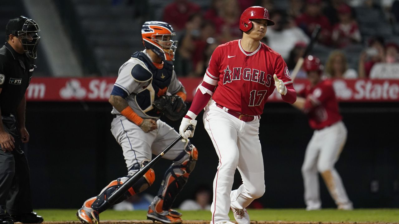 Los Angeles Angels' Shohei Ohtani (17) strikes out during the sixth inning of a baseball game against the Houston Astros, Monday, Sept. 20, 2021, in Anaheim, Calif. (AP Photo/Marcio Jose Sanchez)