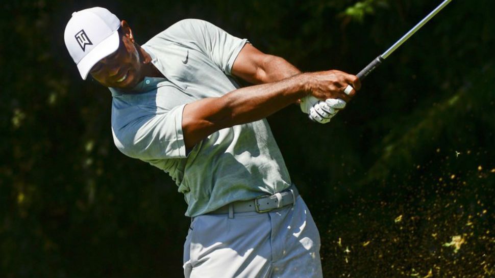 Tiger Woods tees off to the second hole during the second round of the Tour Championship golf tournament, Friday, Sept. 21, 2018, in Atlanta. (AP Photo/John Amis)