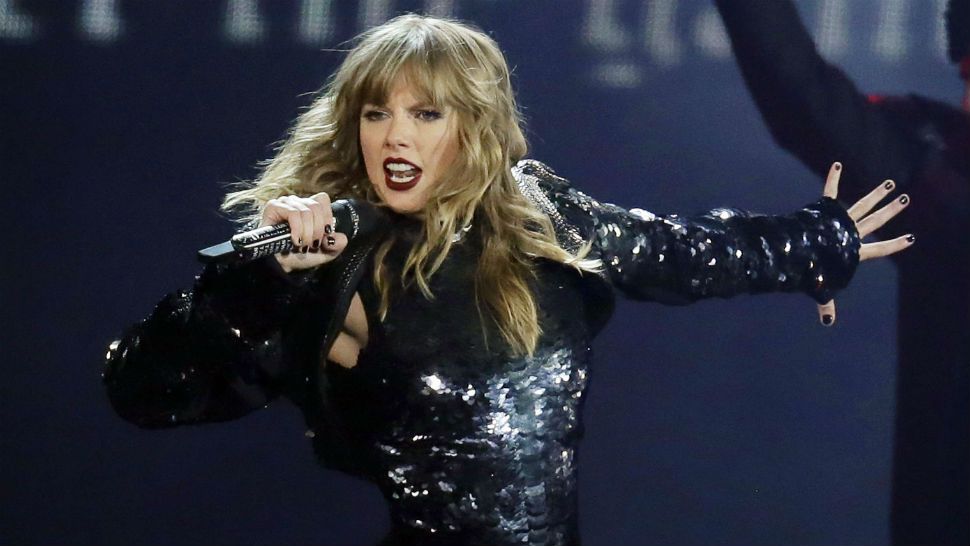 FILE - This May 8, 2018 file photo shows Taylor Swift performing during her "Reputation Stadium Tour" opener in Glendale, Ariz. Eric Swarbrick, 26, of Austin, Texas, has been arrested on federal charges for sending threatening letters to Swift and showing up at her record label in Nashville, Tenn. Federal prosecutors in Nashville said in a press release Thursday, Sept. 20, that Swarbrick has been charged with interstate stalking and sending interstate communications with the intent to threaten. He is currently in custody in Texas and will be brought to Tennessee at a later date. (Photo by Rick Scuteri/Invision/AP, File)
