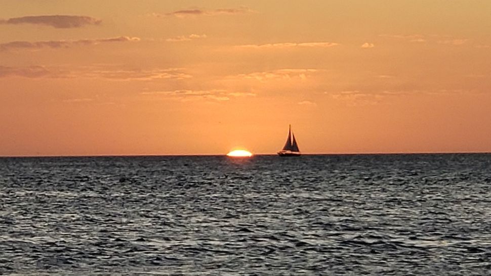 Sent to us with the Spectrum Bay News 9 app: A gorgeous orange sunset from John's Pass on Sunday evening. (Marc DiPaola/viewer)