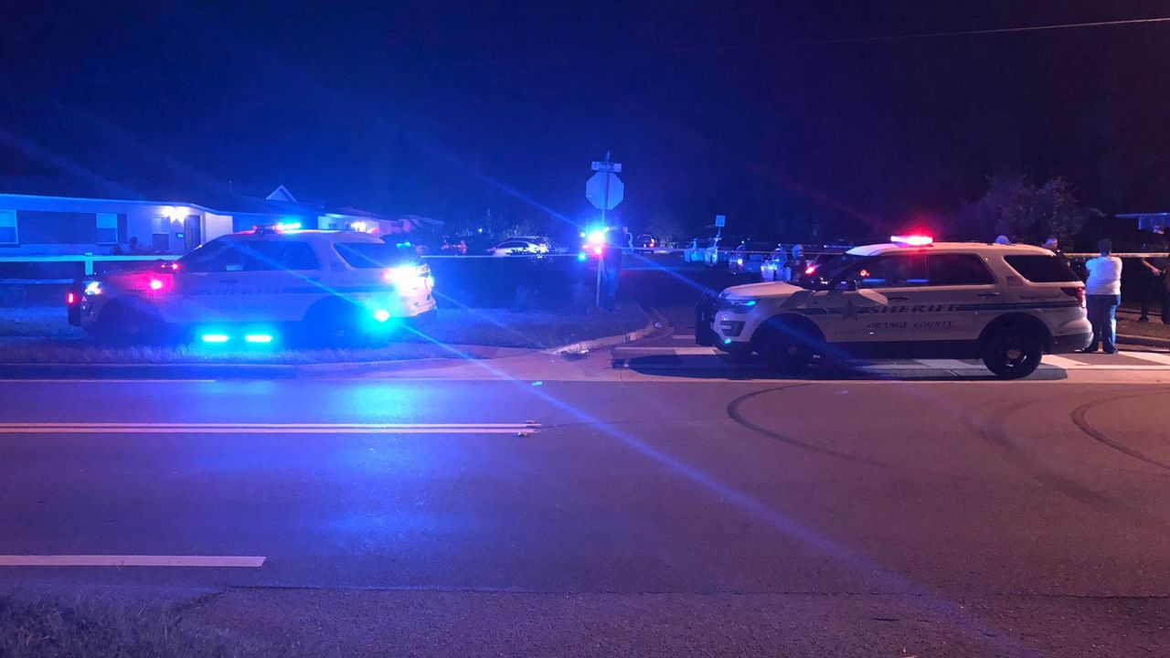 Orange County deputies block off a road Tuesday night after the fatal gang shooting of 3-year-old Daquane James Felix Jr. (Eric Mock, Spectrum News)
