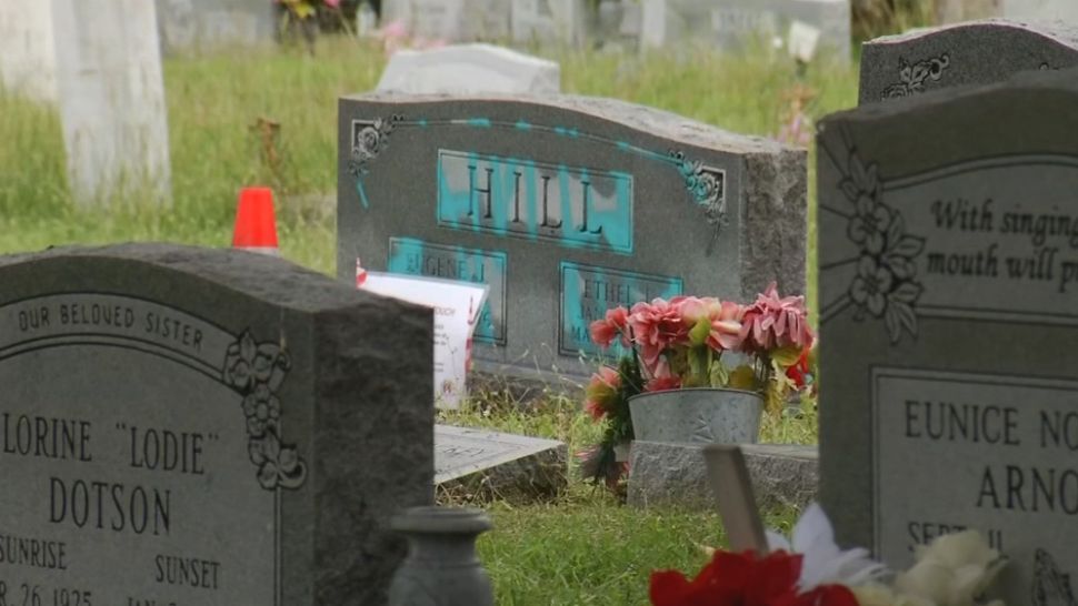 One of several defaced headstones at the Evergreen Cemetery in East Austin. (Spectrum News/File)