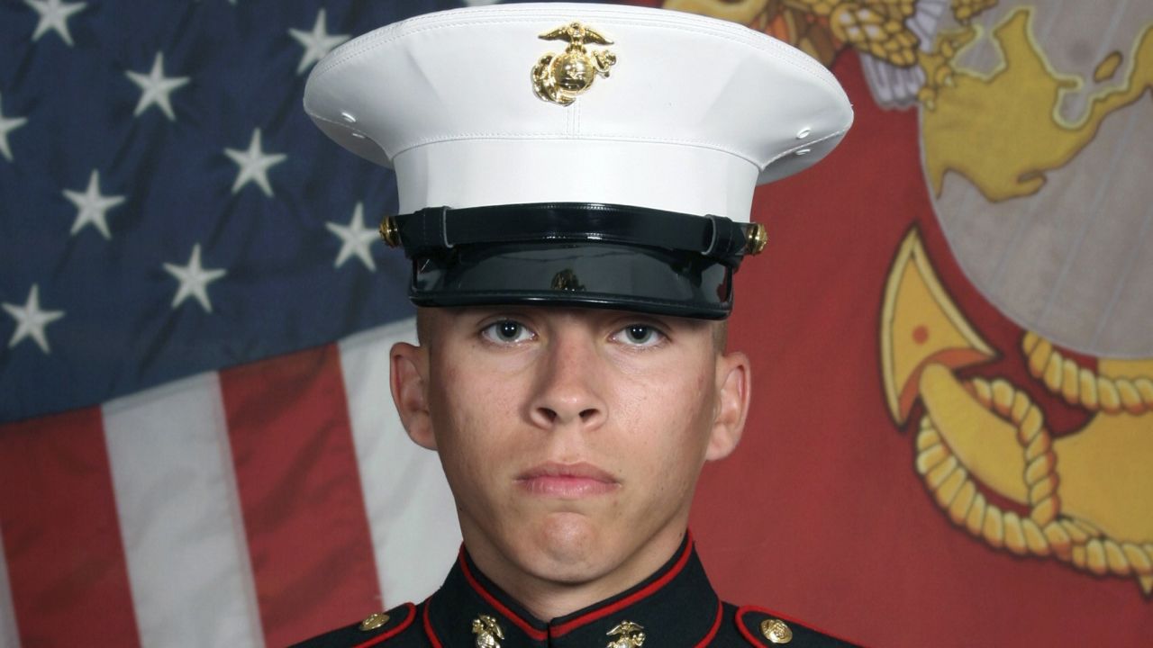 This undated photo released by the 1st Marine Division, Camp Pendleton/U.S. Marines shows Marine Corps Lance Cpl. Dylan R. Merola, 20, of Rancho Cucamonga, Calif. (U.S. Marines via AP)