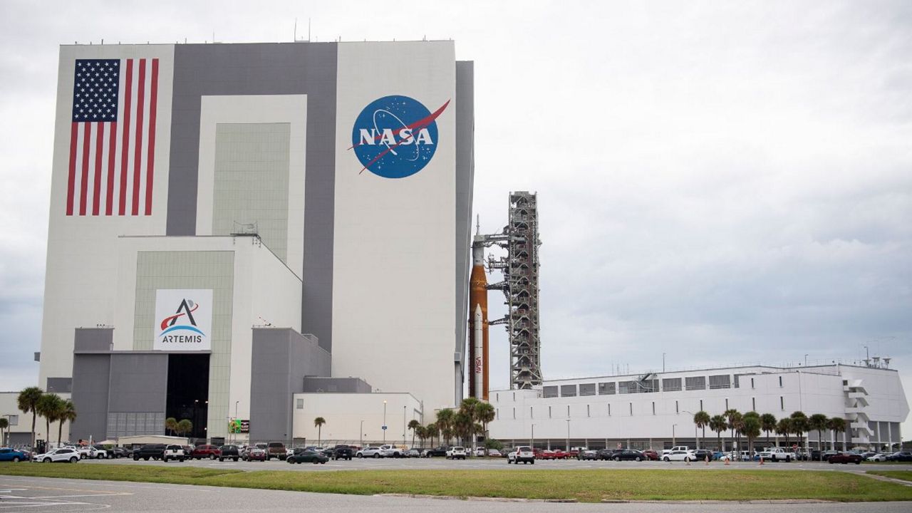 It could take up to half a day to slowly roll back the 212-foot-tall Space Launch System rocket from Launch Pad 39B to the Vehicle Assembly Building. (NASA/Joel Kowsky)
