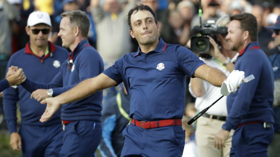 Europe’s Francesco Molinari celebrates after winning a foursome match with his partner Tommy Fleetwood on the opening day of the 42nd Ryder Cup at Le Golf National in Saint-Quentin-en-Yvelines, outside Paris, France, Friday, Sept. 28, 2018. Molinari and Fleetwood beat Justin Thomas of the US and Jordan Spieth 5 and 4. (AP Photo/Matt Dunham)