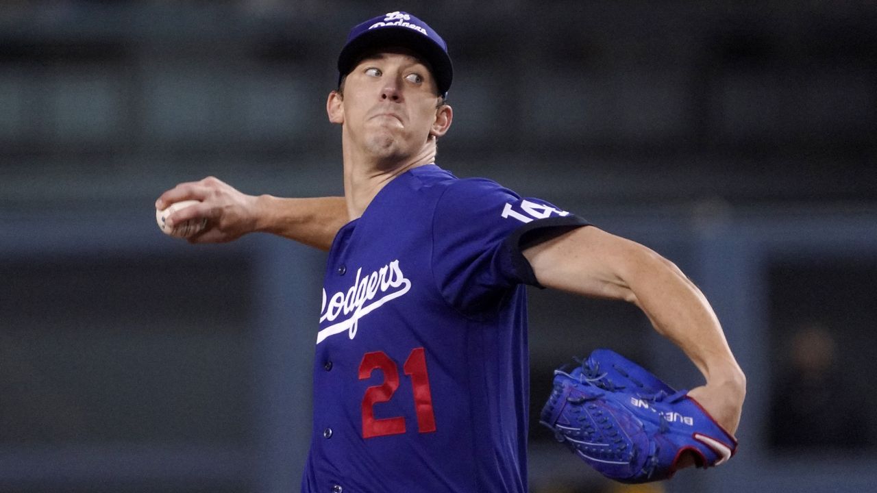 Los Angeles Dodgers starting pitcher Walker Buehler throws to the plate during the first inning of a baseball game against the San Diego Padres Tuesday, Sept. 28, 2021, in Los Angeles. (AP Photo/Mark J. Terrill)
