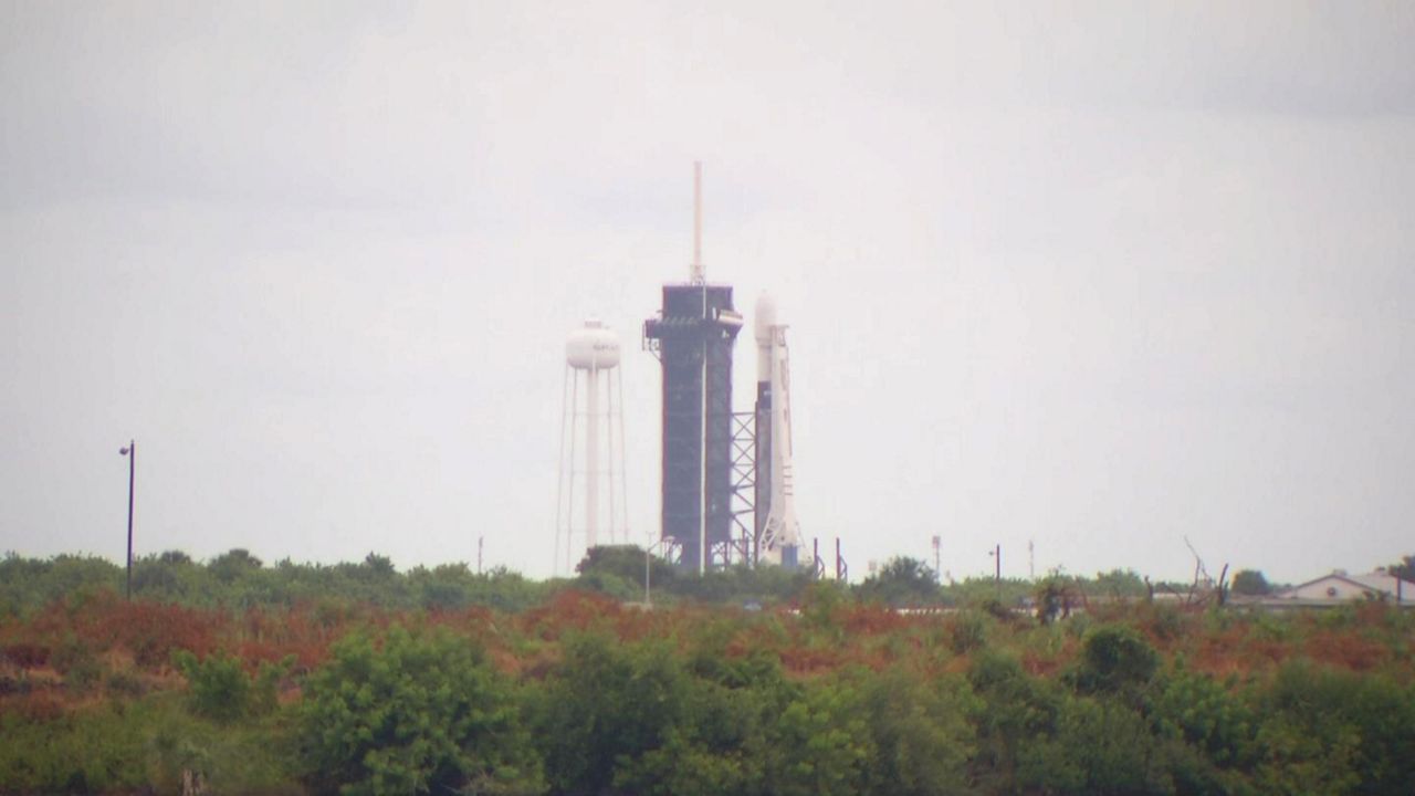 A SpaceX Falcon 9 rocket sits on Launch Pad 39A at Kennedy Space Center on Monday morning. The rocket will deliver another 60 Starlink satellites into orbit. (Jon Shaban/Spectrum News)