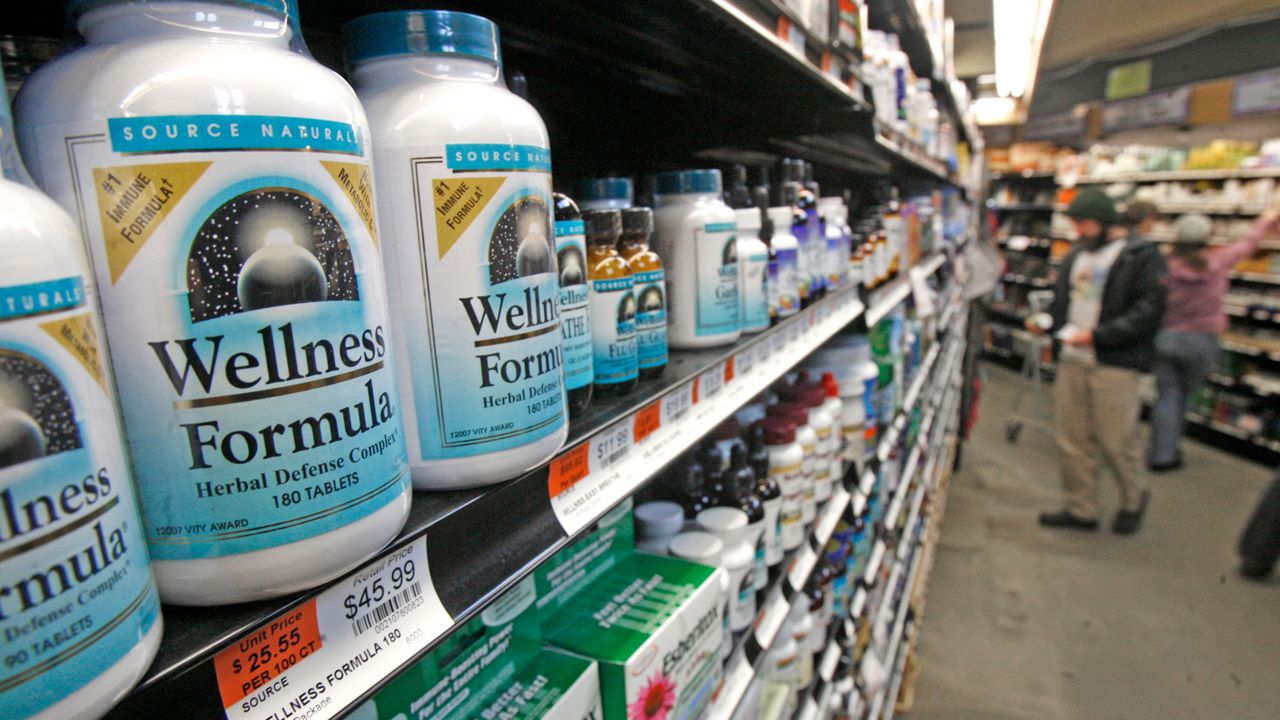 Dietary supplements line store shelves (AP Photo/Toby Talbot)