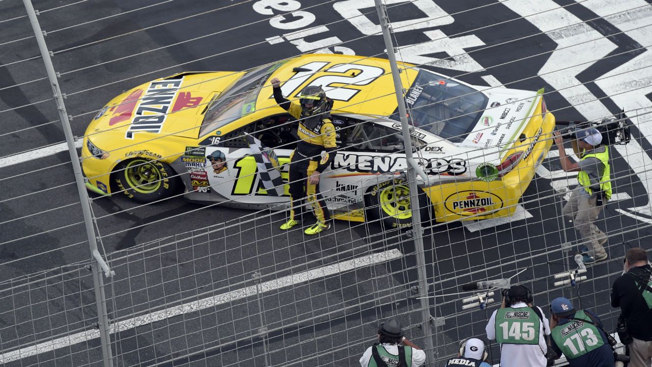 Ryan Blaney celebrates after winning the NASCAR Cup series auto race at Charlotte Motor Speedway in Concord, N.C., Sunday, Sept. 30, 2018. (AP Photo/Mike McCarn)