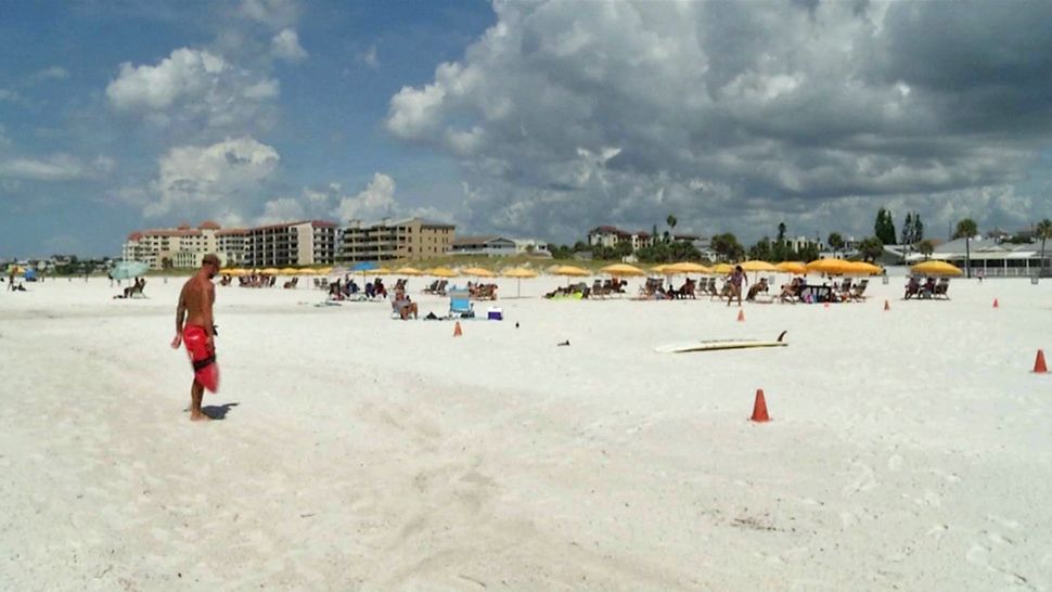 People enjoying Clearwater Beach, Monday, Sept. 17, 2018. 