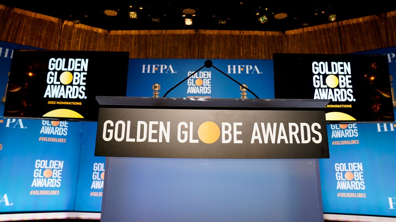 The podium appears prior to the start of the nominations event for 79th annual Golden Globe Awards at the Beverly Hilton Hotel on Monday, Dec. 13, 2021, in Beverly Hills, Calif.  (AP Photo/Chris Pizzello)