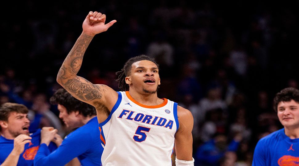 Florida guard Will Richard (5) waves to fans after defeating South Carolina 70 to 69 in an NCAA college basketball game on Wednesday, Jan. 22, 2025, in Columbia, S.C. (AP Photo/Scott Kinser)