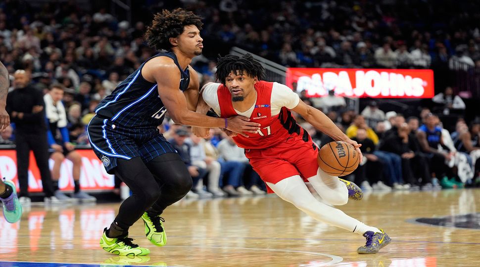 Portland Trail Blazers guard Shaedon Sharpe (17) drives past Orlando Magic guard Jett Howard, left, during the second half of an NBA basketball game, Thursday, Jan. 23, 2025, in Orlando, Fla. (AP Photo/John Raoux)