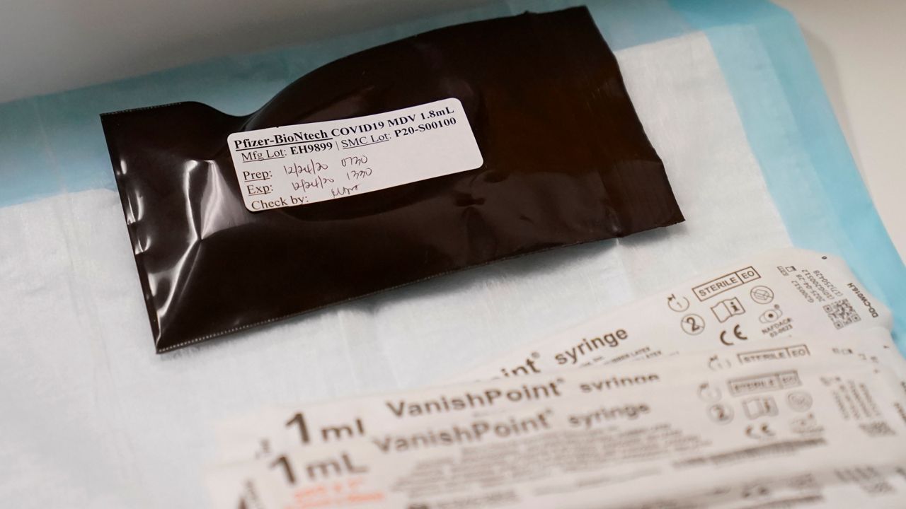 The COVID-19 vaccine from Pfizer at Seton Medical Center in Daly City, Calif., Thursday, Dec. 24, 2020. (AP Photo/Jeff Chiu)