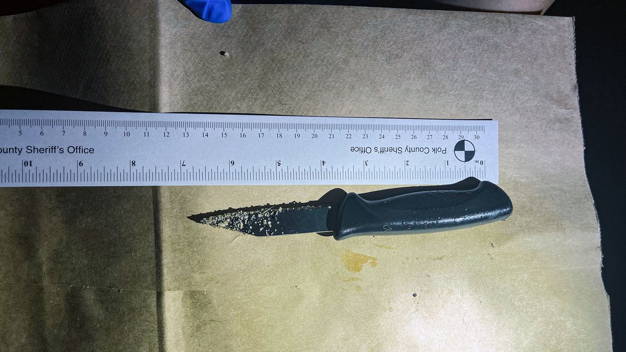 Law enforcement retrieved the knife that they say a suspect used to threaten law enforcement officers. After sending a K-9 after the supect and using a Taser, law enforcement officers "were forced to fire" at the suspect, who died, stated the Polk County Sheriff's Office. (Photo courtesy of the Polk County Sheriff's Office)