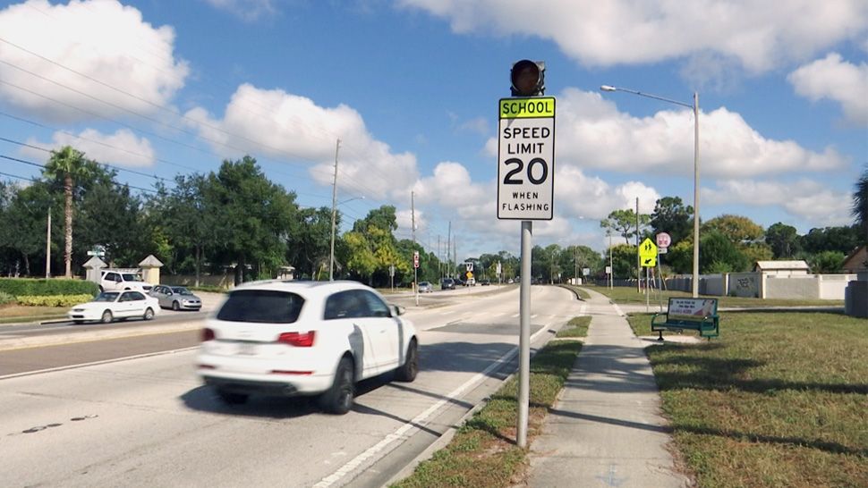A.J. Williams says the school zones near her house are not close to the schools themselves along Goldenrod Road, south of Curry Ford Road. However, Orange County has an answer to this. (Ryan Harper/Spectrum News 13)