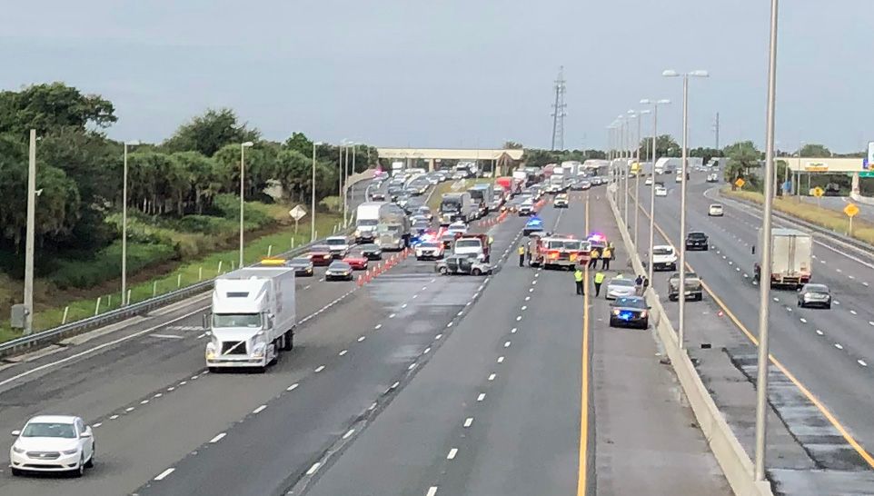 A crash killed a driver and hurt 2 young passengers at about 6:45 a.m. Monday in the southbound lanes of the Florida's Turnpike near Colonial Drive. (Andrew Fergerson/Spectrum News 13)