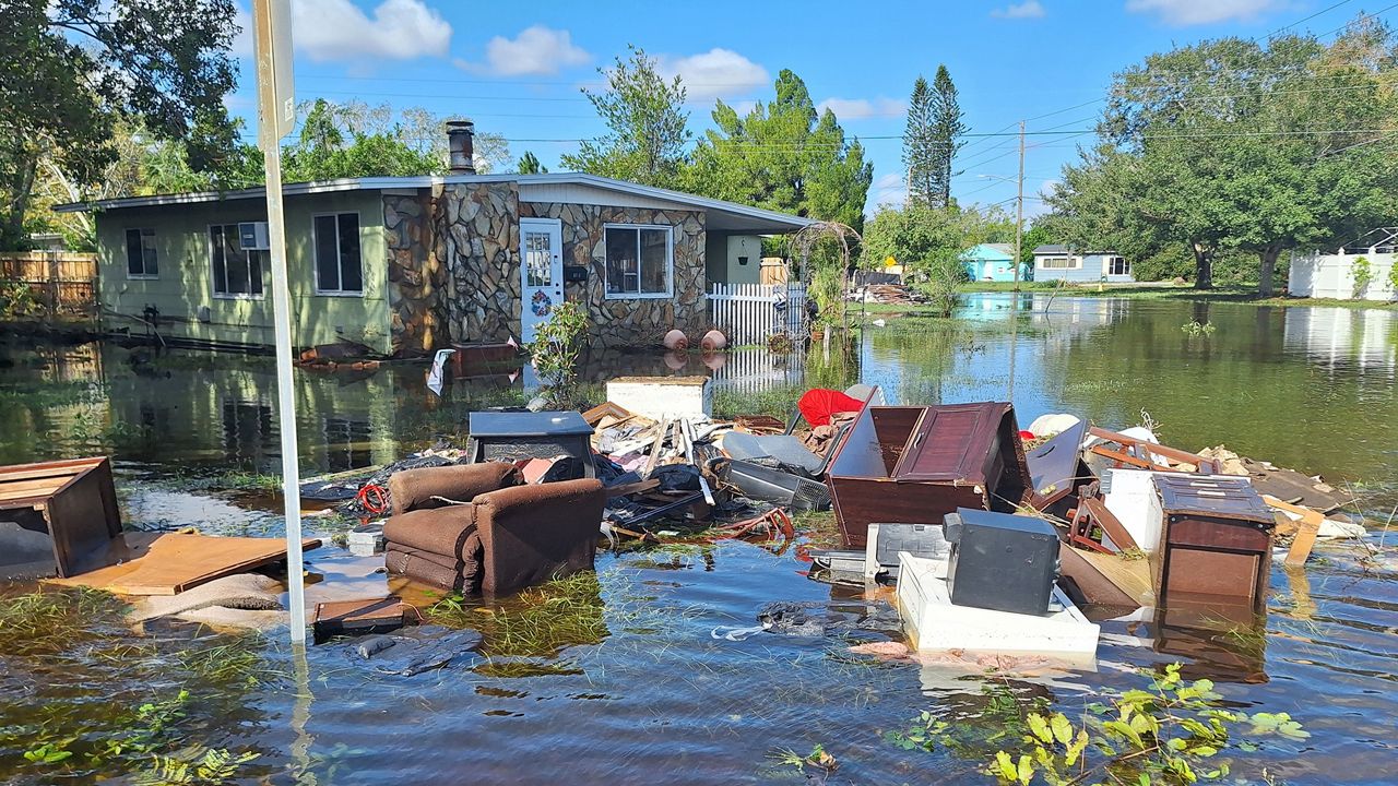 Furniture is seen floating in a yard in north St. Pete after Hurricane Milton on Friday, Oct. 10, 2024. (View photo Ana St Pierre )