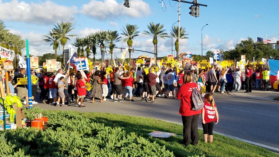 Hundreds of the 38,000 full and part-time employees affected rallied for a raise on Thursday, Oct. 20. (Cheryn Stone, staff)